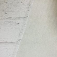 Varrható merevítő közbélés