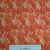Batikolt narancsos textil